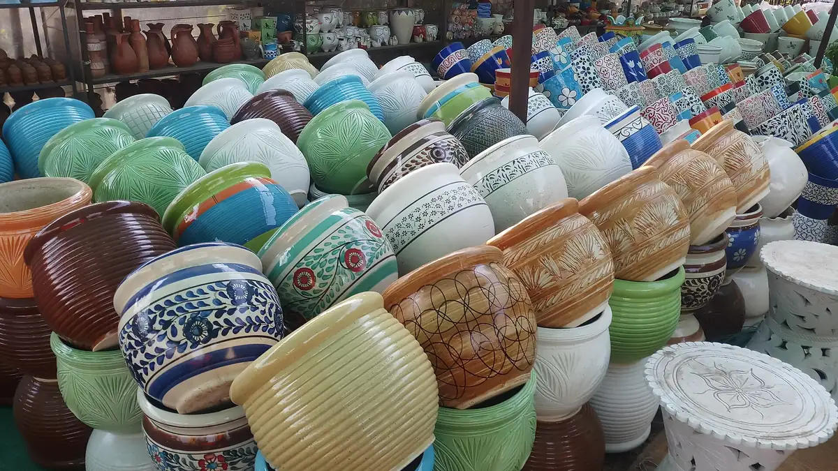 Stacks of colourful pots for sale in Pune